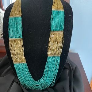 Womens multi layered beaded Turquoise and gold necklace